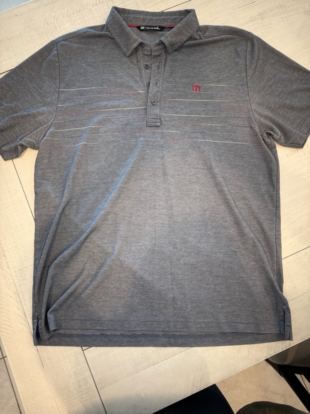 Travis Mathew Heather Gray Polo with Subtle Stripe & Red Logo